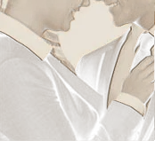 Man and woman in business attire standing close together, face to face.