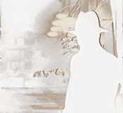 Silhouette of a man in a fedora hat standing in a dark alleyway at night.